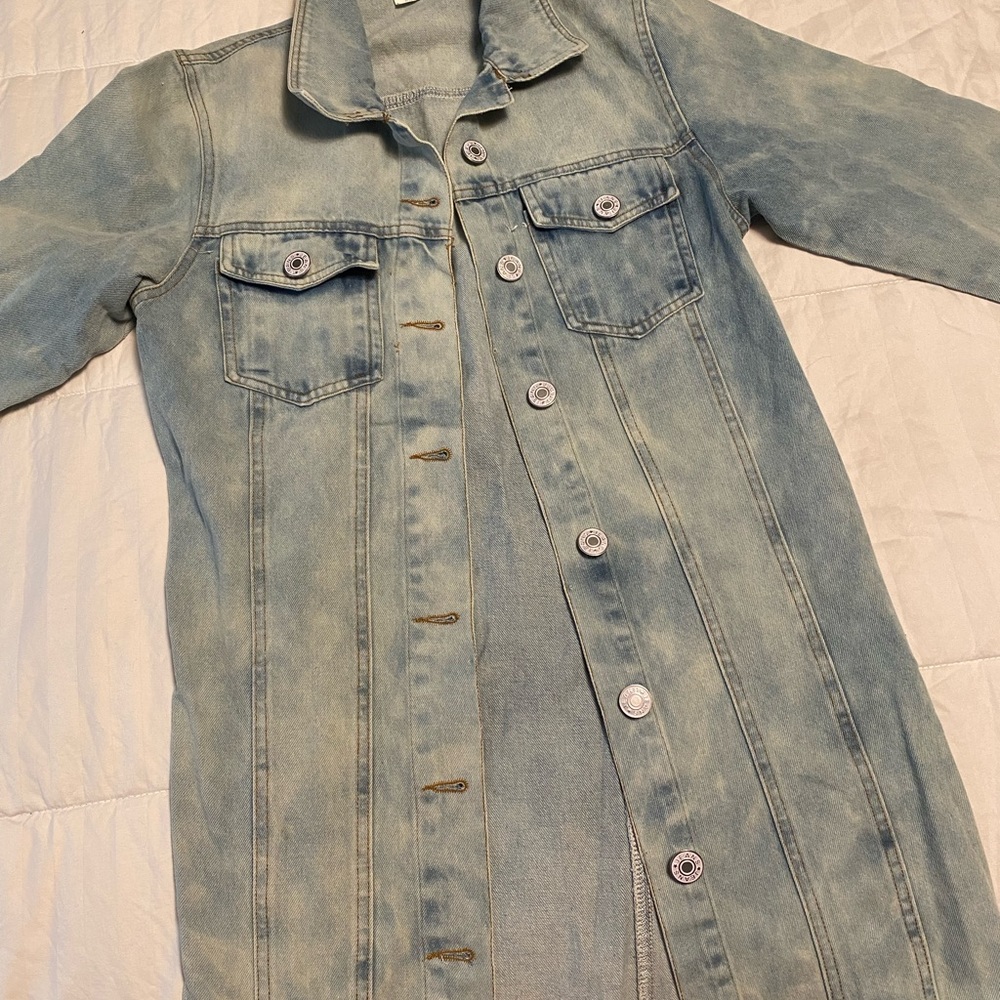 Medium wash denim Jean jacket. Super cute with leggings!
